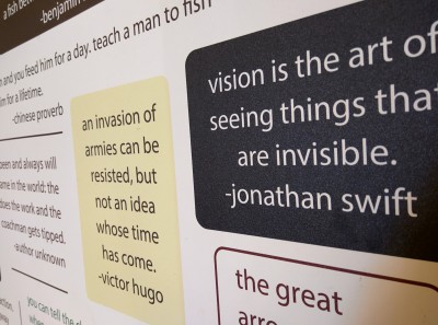 Pieology Quotes Close Up of a Wall with Quotes Written on it
