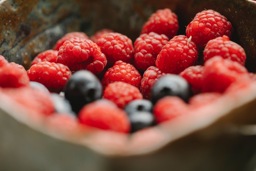 Core De Force Meal Plan Tips Close Up of a Small Bowl of Raspberries and Blueberries