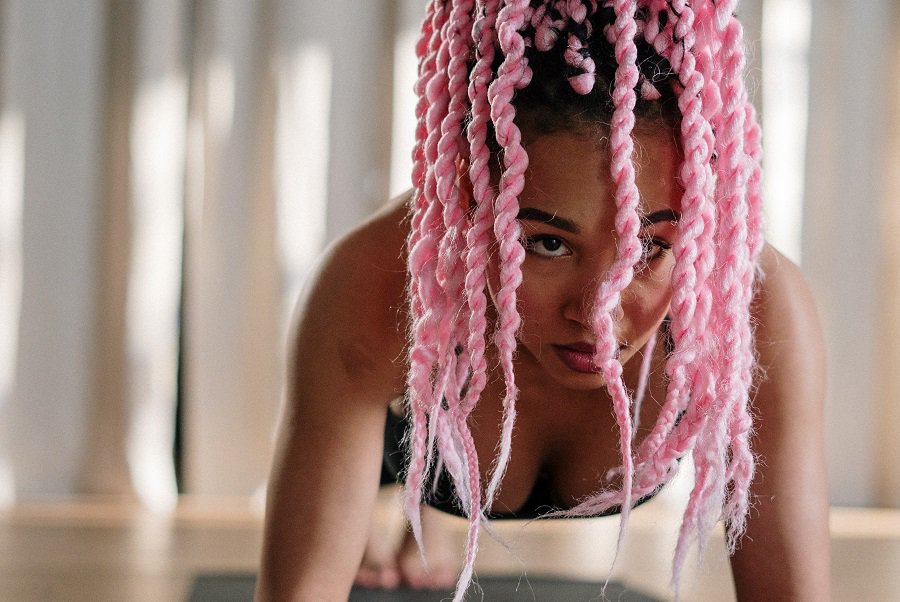 Core De Force Review Woman Doing a Plank