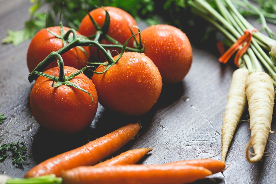 2B Mindset Veggies Most Breakfast Ideas Close Up of Tomatoes and Carrots on a Counter Top
