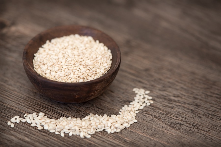 LIIFT4 Meal Plan D Recipes for Close Up of a Bowl of Sesame Seeds on a Wooden Surface