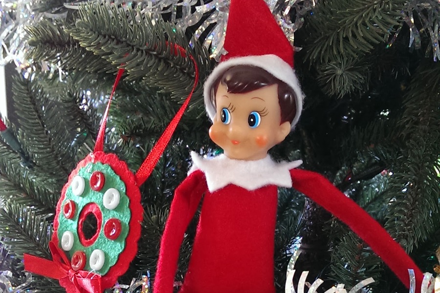 Elf on The Shelf Ideas on Pinterest Close Up of an Elf in a Christmas Tree Next to an Ornament