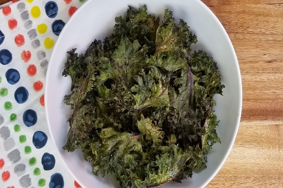 Healthy Summer Dinners Close Up of Kale Chips in a White Bowl
