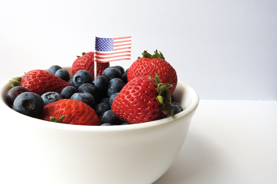 Low Carb Fourth of July Desserts Close Up of a White Bowl with Strawberries and Blueberries