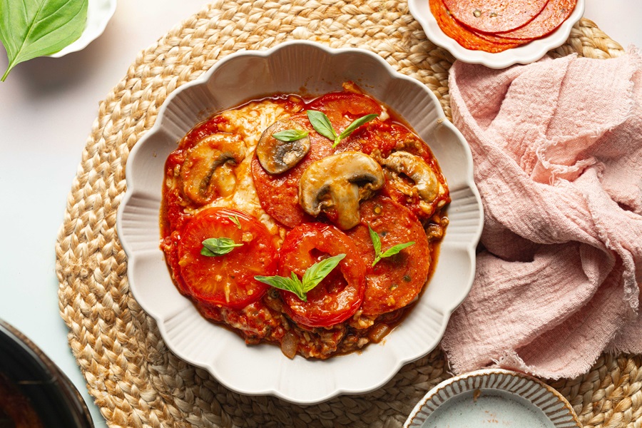 Keto Crockpot Casserole for Pizza Lovers a Serving Platter Filled with Pizza Casserole
